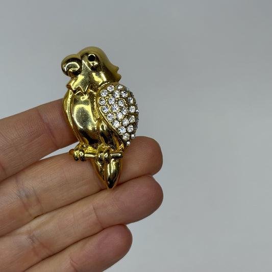 Spilla vintage placcata oro pappagallo 1960s